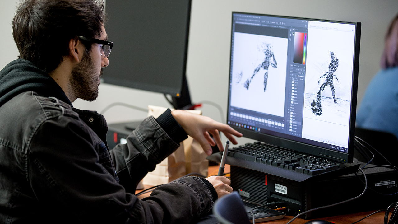 A man using a laptop computer