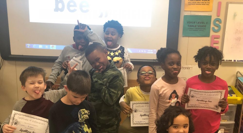 A group of people posing for the camera